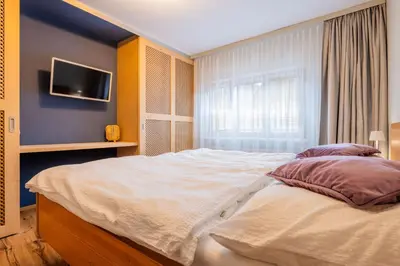 Ein Bett oder Betten in einem Zimmer der Unterkunft Haus Christina - Romantik Suite