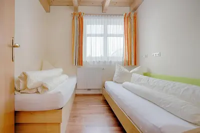 Ein Bett oder Betten in einem Zimmer der Unterkunft Appartement Klostertal
