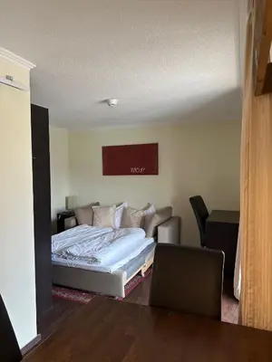 Ein Bett oder Betten in einem Zimmer der Unterkunft S'Matt 3