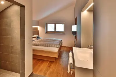 Ein Bett oder Betten in einem Zimmer der Unterkunft Appartements Täli