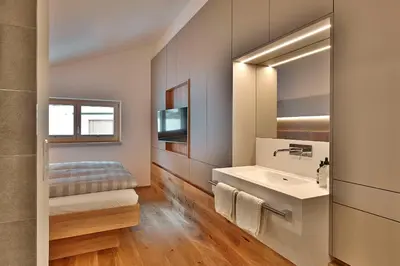 Ein Bett oder Betten in einem Zimmer der Unterkunft Appartements Täli