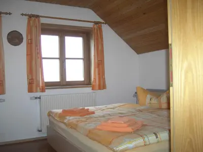 Ein Bett oder Betten in einem Zimmer der Unterkunft Friesenhof Blank