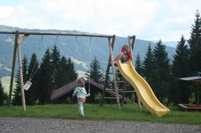 Ein Kinderspielbereich in der Unterkunft Friesenhof Blank
