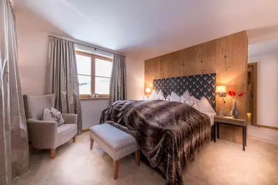 Ein Bett oder Betten in einem Zimmer der Unterkunft Circle Chalets Arlberg Ski in - Ski out