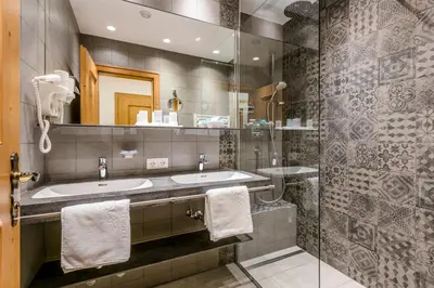 Ein Badezimmer in der Unterkunft Cresta.Alpin.Sport.Hotel