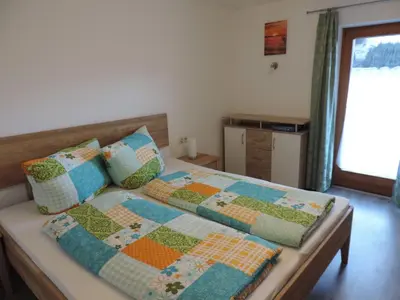 Ein Bett oder Betten in einem Zimmer der Unterkunft Ferienwohnung Rudigier Elke
