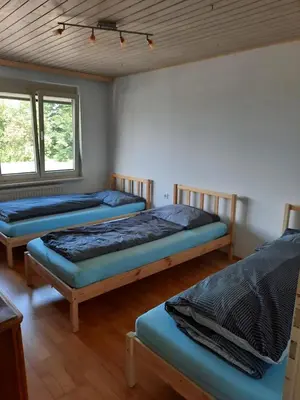Ein Bett oder Betten in einem Zimmer der Unterkunft Dimai House No 31 Dornbirn Messe
