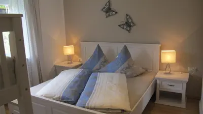 Ein Bett oder Betten in einem Zimmer der Unterkunft Ferienhaus Windegge