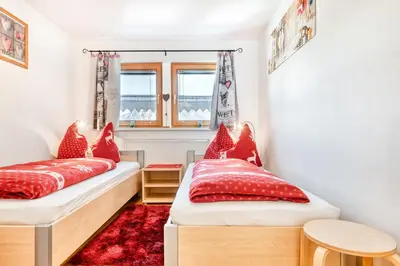 Ein Bett oder Betten in einem Zimmer der Unterkunft Chalet Fischer by A-Appartments