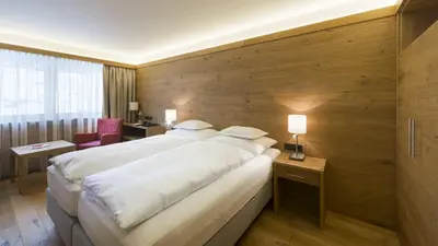 Ein Bett oder Betten in einem Zimmer der Unterkunft Hotel Garni Panorama
