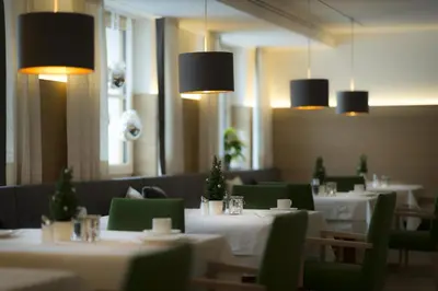 Ein Restaurant oder anderes Speiselokal in der Unterkunft Hotel Garni Panorama