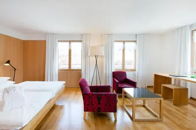 Ein Bett oder Betten in einem Zimmer der Unterkunft Krone Hittisau - Hotel & Restaurant im Bregenzerwald