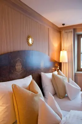 Ein Bett oder Betten in einem Zimmer der Unterkunft Hotel Sonnenburg