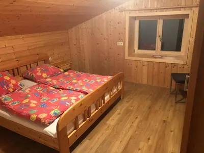 Ein Bett oder Betten in einem Zimmer der Unterkunft Ferienhaus am Waldrand von Egg Bregenzer Wald