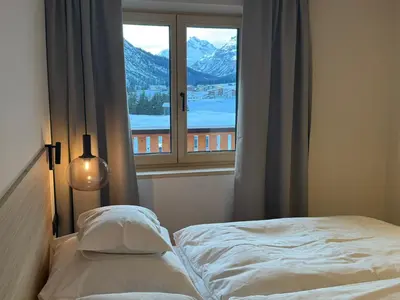 Ein Bett oder Betten in einem Zimmer der Unterkunft Almrösle Apartments