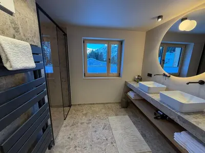 Ein Badezimmer in der Unterkunft Almrösle Apartments