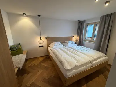 Ein Bett oder Betten in einem Zimmer der Unterkunft Almrösle Apartments