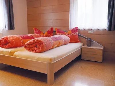 Ein Bett oder Betten in einem Zimmer der Unterkunft Apartment Silbertal - Ferienwohnung