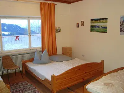Ein Bett oder Betten in einem Zimmer der Unterkunft Berg & Skihütte -Schmittenhof