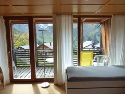 Ein Bett oder Betten in einem Zimmer der Unterkunft Widderstein Apartments