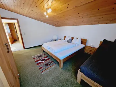 Ein Bett oder Betten in einem Zimmer der Unterkunft Haus Rätikon