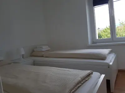 Ein Bett oder Betten in einem Zimmer der Unterkunft Green Hill Apartments - Feldkirch