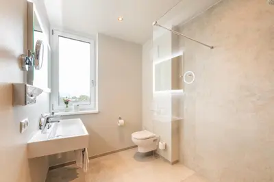 Ein Badezimmer in der Unterkunft Motel Keckeis Inn - Self Check-in