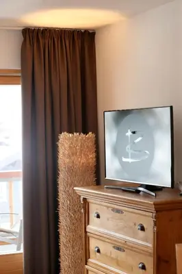 TV/Unterhaltungsangebot in der Unterkunft Biotel Bertel Naturappartements