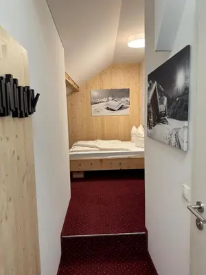 Ein Bett oder Betten in einem Zimmer der Unterkunft Hotel Pension Löwen nahe Feldkirch - günstige Zimmer für Urlauber, Firmen und Monteure