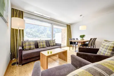 Ein Sitzbereich in der Unterkunft Bergzauber Appartements
