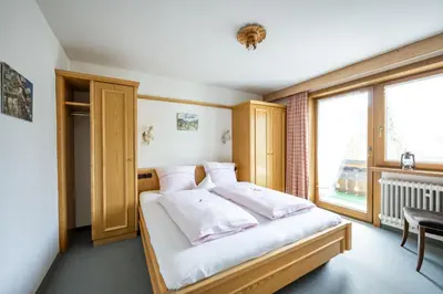 Ein Bett oder Betten in einem Zimmer der Unterkunft Haus Widdersteinblick