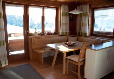 Ein Sitzbereich in der Unterkunft Ferien in Feld 109