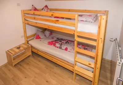 Ein Bett oder Betten in einem Zimmer der Unterkunft Ferienwohnung Lerch