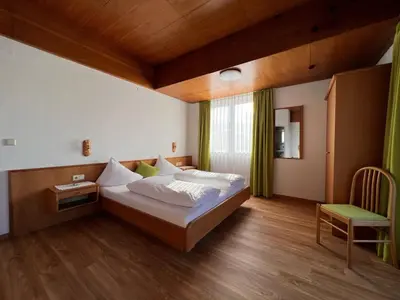 Ein Bett oder Betten in einem Zimmer der Unterkunft Pension Wachter