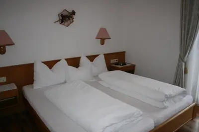 Ein Bett oder Betten in einem Zimmer der Unterkunft Pension Wachter