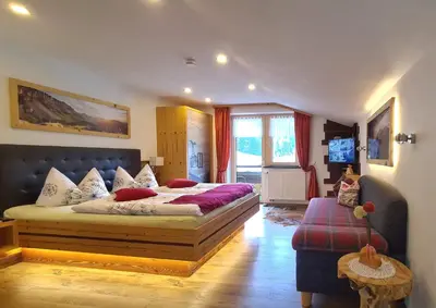 Ein Bett oder Betten in einem Zimmer der Unterkunft Haus Alpenglück