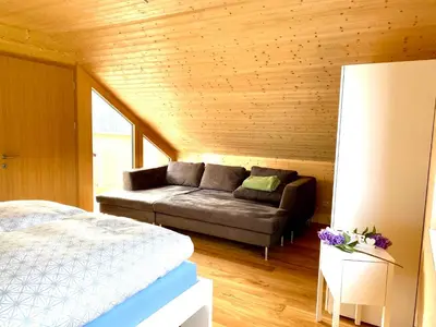 Ein Bett oder Betten in einem Zimmer der Unterkunft Rosenhaus 2