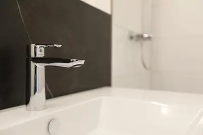 Ein Badezimmer in der Unterkunft Saminapark Aparthotel