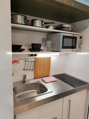 Küche/Küchenzeile in der Unterkunft Saminapark Aparthotel