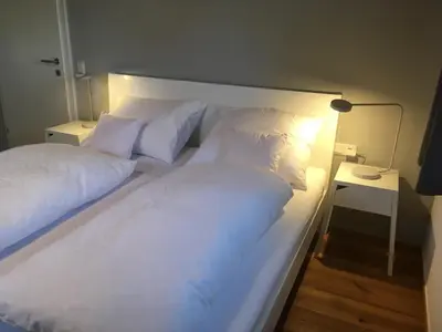 Ein Bett oder Betten in einem Zimmer der Unterkunft Wohnung in zentraler Lage im Rheintal