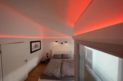 Ein Bett oder Betten in einem Zimmer der Unterkunft Dachgeschoss Designer-Loft Arlberg - Montafon