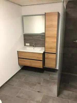 Ein Badezimmer in der Unterkunft Murmenta Appartements