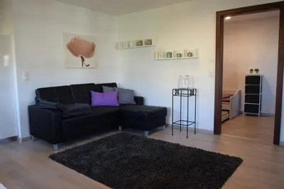 Ein Sitzbereich in der Unterkunft Ferienwohnung Auszeit