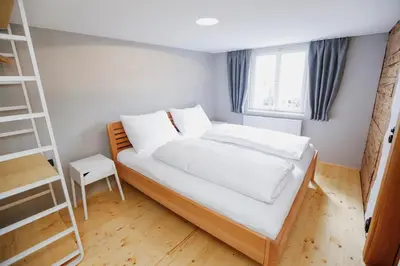 Ein Bett oder Betten in einem Zimmer der Unterkunft HEINRICH Stadtwohnung im Jüdischen Viertel