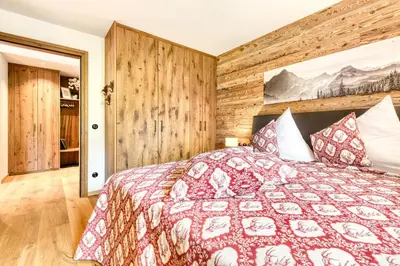 Ein Bett oder Betten in einem Zimmer der Unterkunft Chalet GM - Gesamtes Haus by A-Appartments