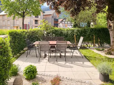 Ein Garten an der Unterkunft D`Alpenapartments Bezau