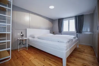 Ein Bett oder Betten in einem Zimmer der Unterkunft MINA Stadtwohnung im Jüdischen Viertel