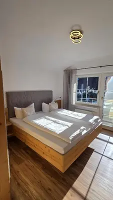Ein Bett oder Betten in einem Zimmer der Unterkunft Gästehaus Annette