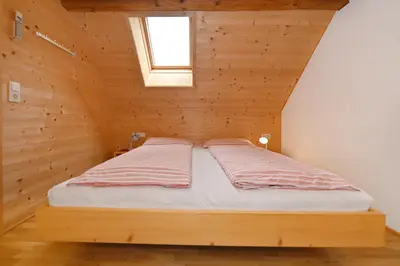 Ein Bett oder Betten in einem Zimmer der Unterkunft Der BiscHOF
