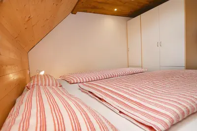 Ein Bett oder Betten in einem Zimmer der Unterkunft Der BiscHOF